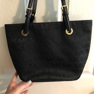 Black Michael Kors tote.